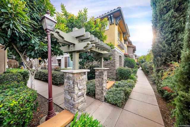 exterior space featuring a pergola