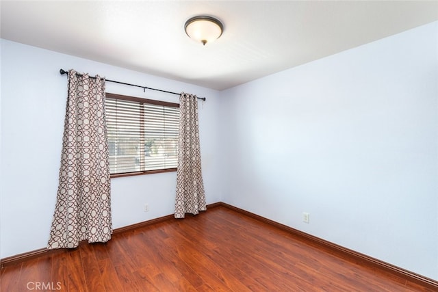 929 Pinecone Dr, Corona, CA 92878 - unfurnished room with dark wood-style floors and baseboards