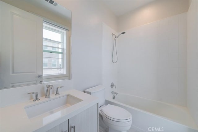 full bathroom with visible vents, vanity, toilet, and tub / shower combination