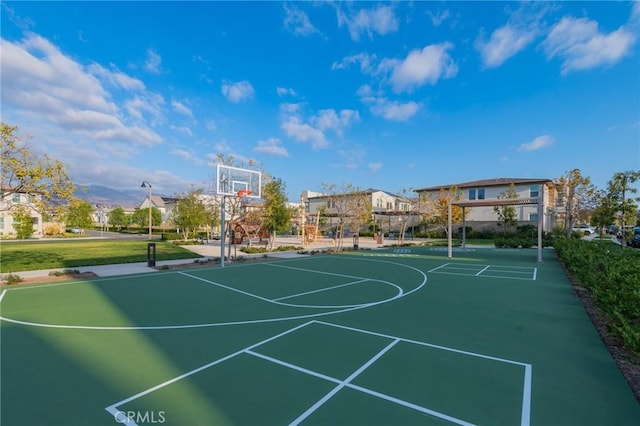 view of sport court with community basketball court and a residential view