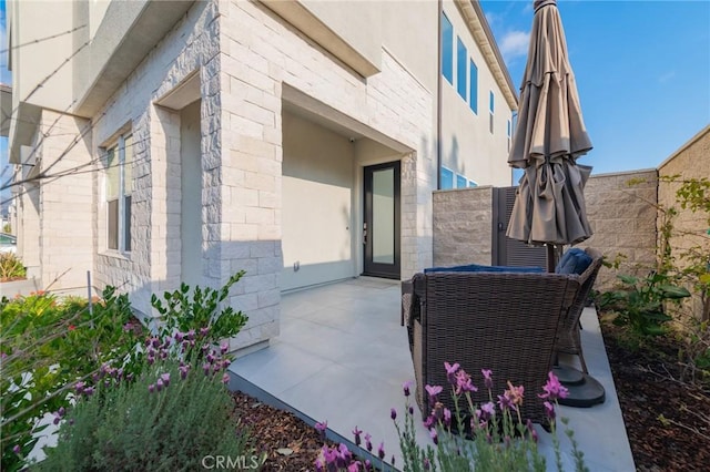 view of patio with fence