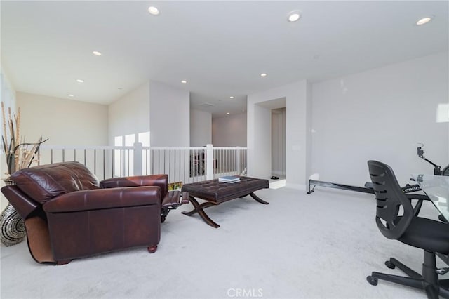 carpeted office with recessed lighting