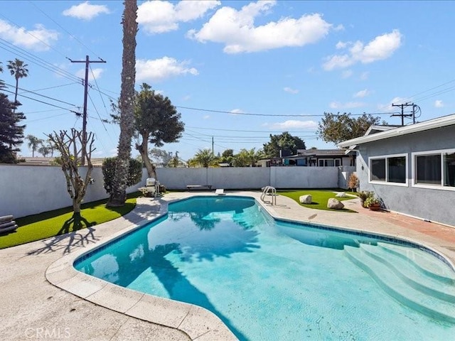 view of swimming pool with a patio, a fenced backyard, and a fenced in pool