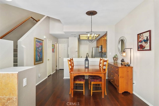 dining room featuring stairs, baseboards, dark wood finished floors, and a notable chandelier