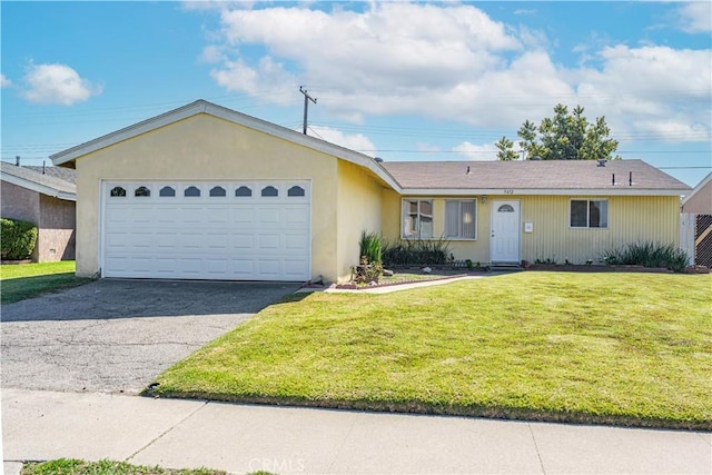 ranch-style house featuring a garage, driveway, a front lawn, and stucco siding