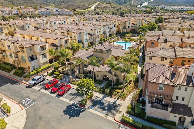 birds eye view of property with a residential view