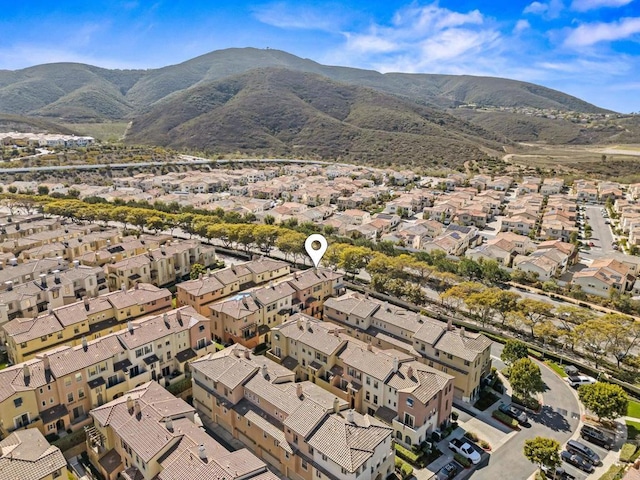 bird's eye view featuring a residential view and a mountain view