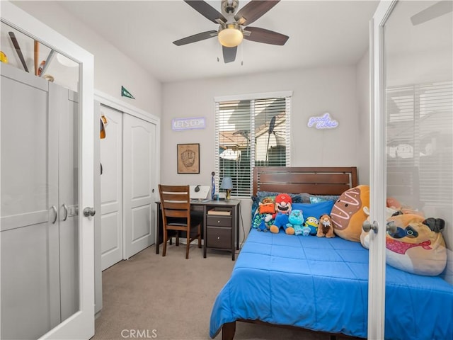 bedroom with carpet floors and a ceiling fan