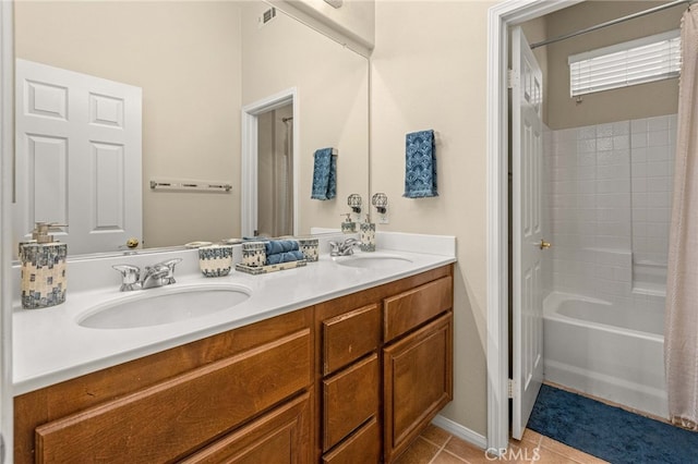 full bath featuring tile patterned flooring, a sink, shower / bath combo with shower curtain, and double vanity