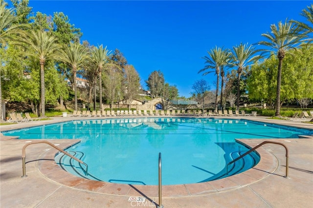 community pool with a patio