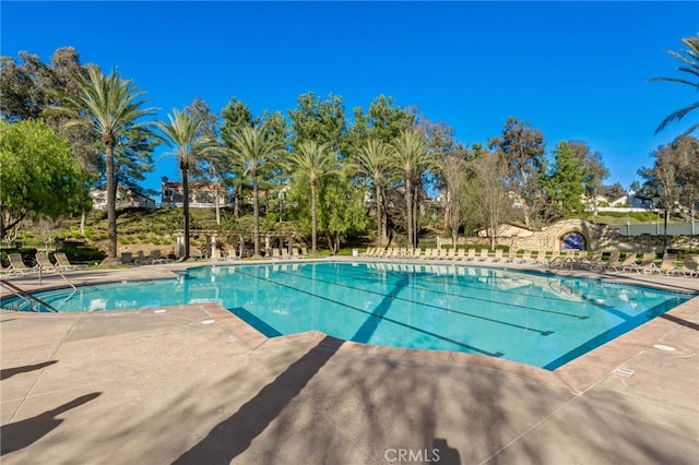 community pool with a patio