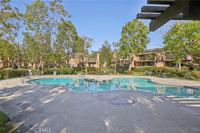 pool with a patio