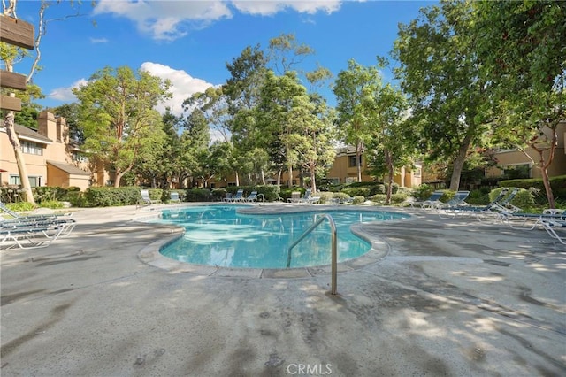 pool featuring a patio area