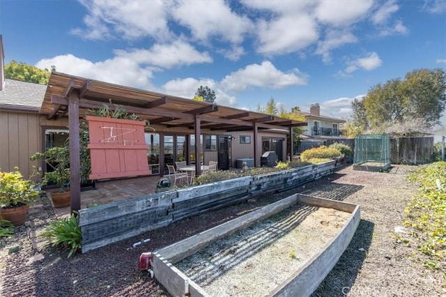 exterior space featuring a patio and a garden