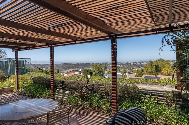 view of patio / terrace featuring fence and a pergola