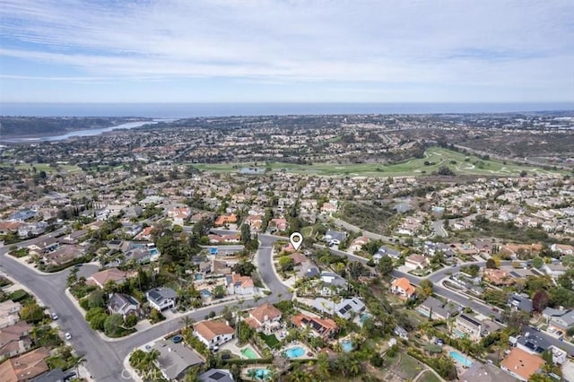 birds eye view of property with a residential view