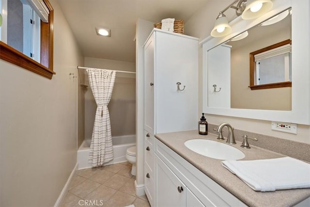 full bathroom featuring toilet, shower / bath combo, vanity, baseboards, and tile patterned floors