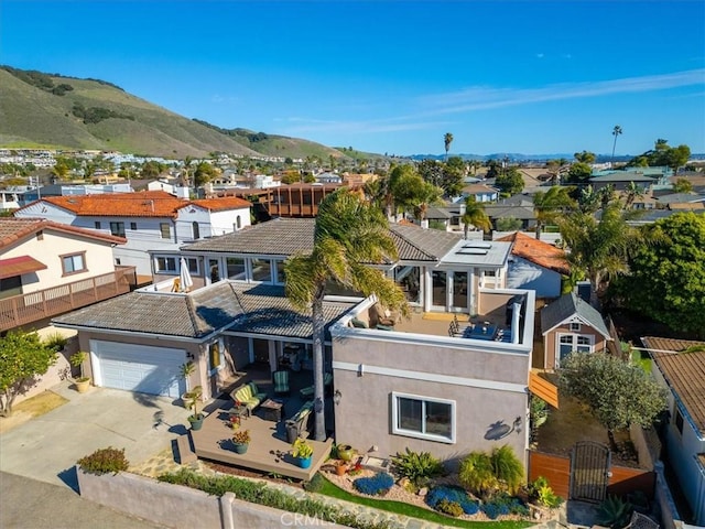 birds eye view of property featuring a residential view and a mountain view