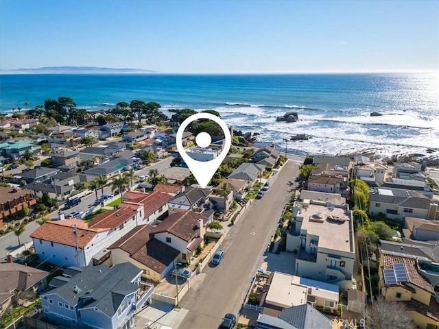 bird's eye view with a water view and a residential view