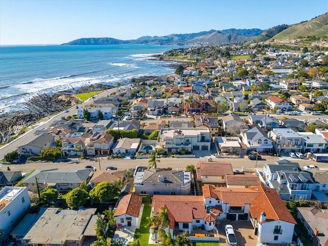 bird's eye view with a residential view and a water and mountain view