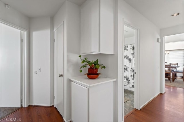 19390 Okeechobee Ln, Lake Elsinore, CA 92530 - corridor featuring wood finished floors and baseboards