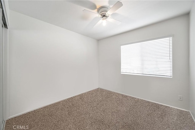 19390 Okeechobee Ln, Lake Elsinore, CA 92530 - unfurnished room with carpet flooring, ceiling fan, and baseboards