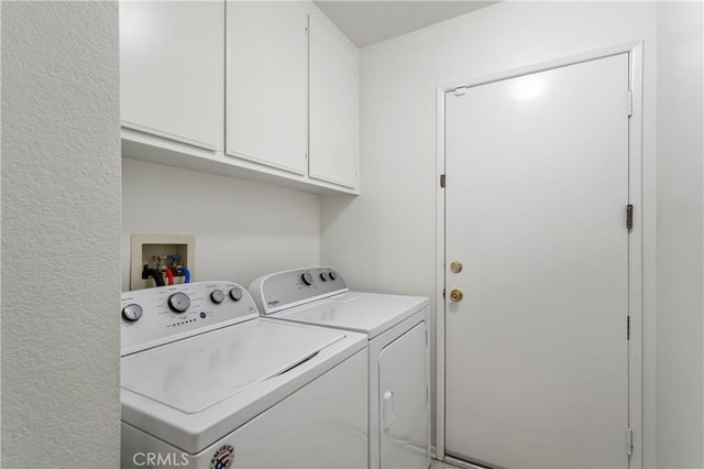 19390 Okeechobee Ln, Lake Elsinore, CA 92530 - laundry room with cabinet space and washing machine and clothes dryer