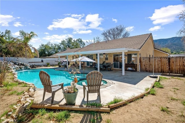 19390 Okeechobee Ln, Lake Elsinore, CA 92530 - view of pool with a fenced backyard, a patio, and a mountain view