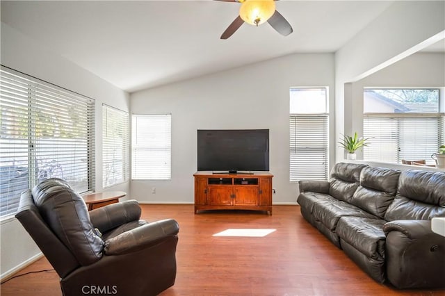 19390 Okeechobee Ln, Lake Elsinore, CA 92530 - living room featuring lofted ceiling, ceiling fan, wood finished floors, and baseboards