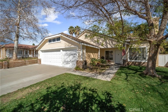 19390 Okeechobee Ln, Lake Elsinore, CA 92530 - view of front of house featuring a garage, driveway, and brick siding
