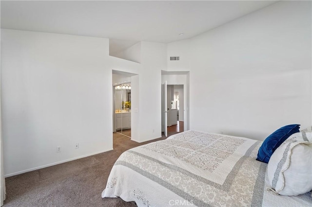 19390 Okeechobee Ln, Lake Elsinore, CA 92530 - carpeted bedroom featuring baseboards and ensuite bathroom