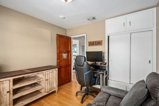 office area featuring visible vents and light wood finished floors