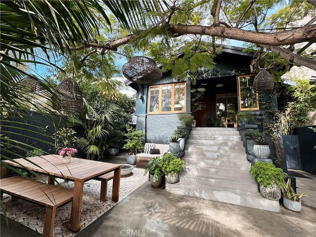 exterior space with outdoor dining area