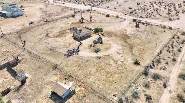 aerial view with view of desert and a rural view