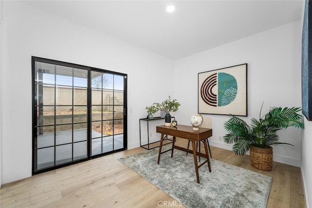 office area featuring baseboards, wood finished floors, and recessed lighting