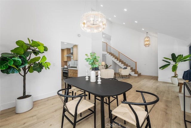 dining space with recessed lighting, stairway, a chandelier, light wood-type flooring, and baseboards