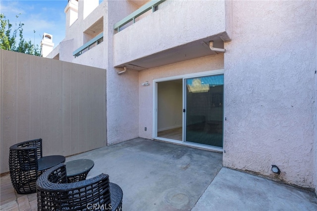 view of patio / terrace with fence