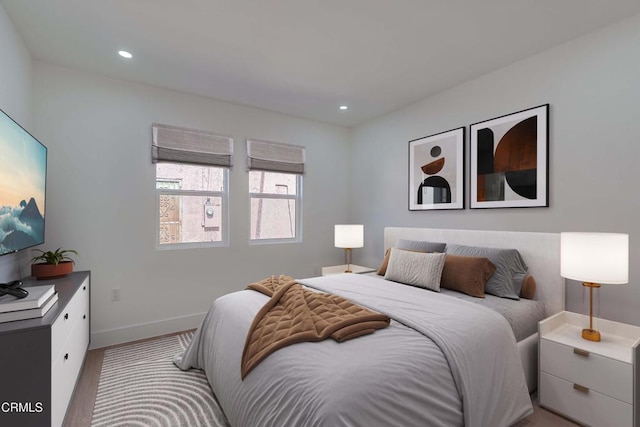 bedroom featuring recessed lighting, wood finished floors, and baseboards