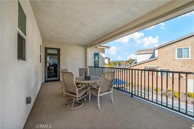 balcony featuring outdoor dining area