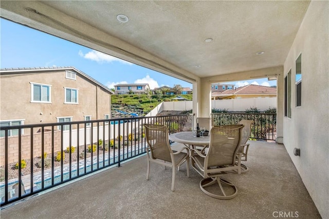 balcony with outdoor dining area