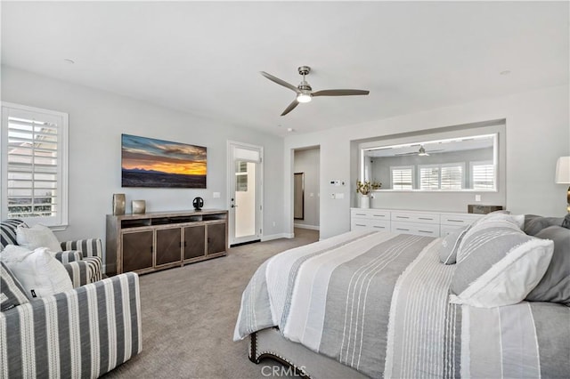 bedroom featuring ceiling fan, carpet floors, and baseboards