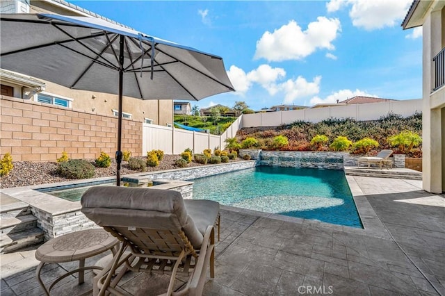 view of swimming pool featuring a fenced backyard, a fenced in pool, and a patio