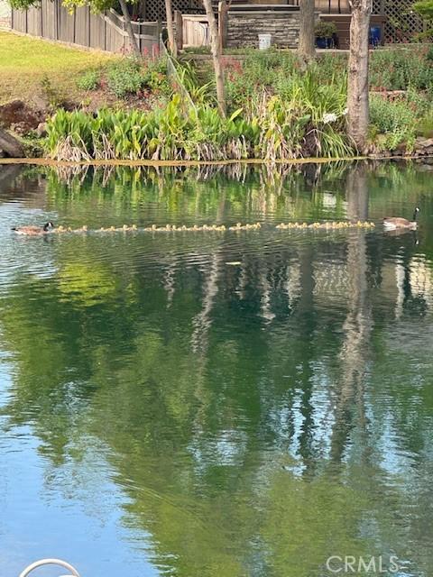 property view of water with fence