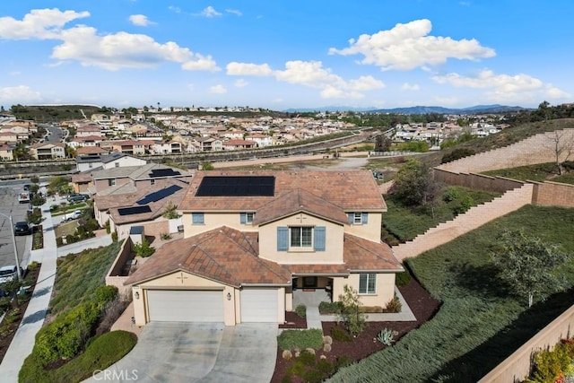 birds eye view of property with a residential view