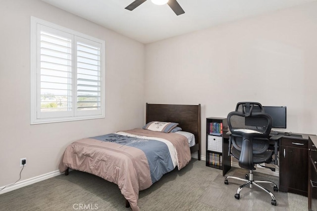 bedroom with baseboards, ceiling fan, and light colored carpet