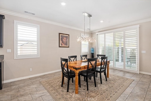 dining area featuring ornamental molding, visible vents, plenty of natural light, and baseboards