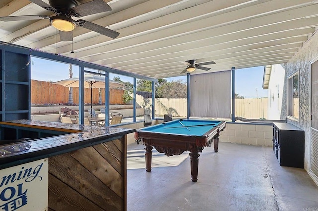 recreation room featuring a healthy amount of sunlight, a ceiling fan, unfinished concrete flooring, and pool table