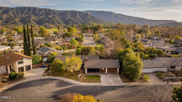 bird's eye view featuring a residential view and a mountain view