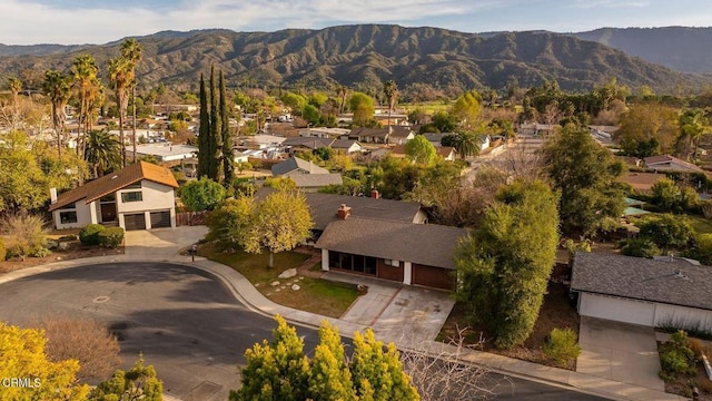 birds eye view of property featuring a residential view and a mountain view