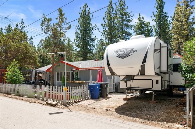 view of front of property with a fenced front yard